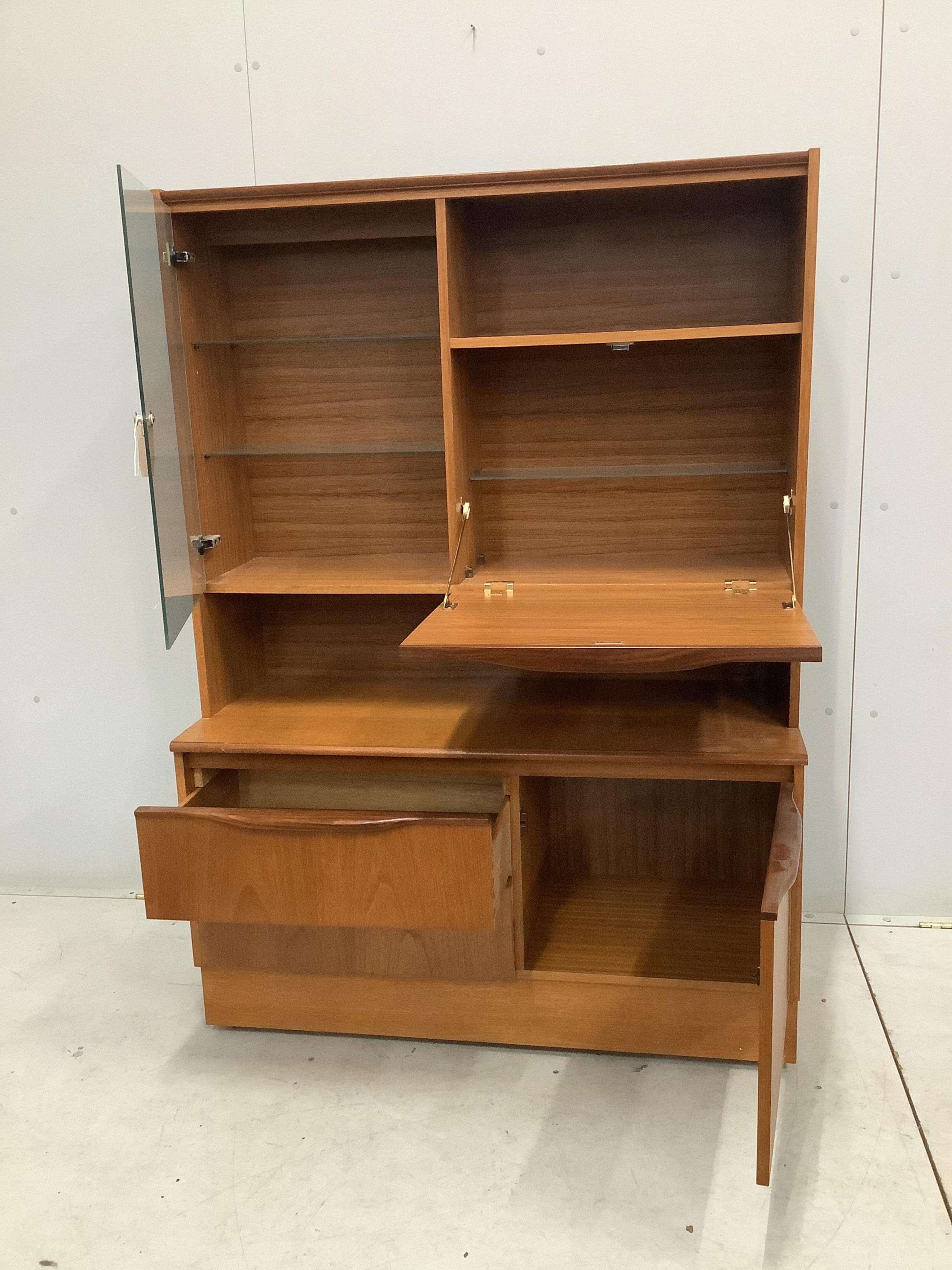 A G plan display unit, width 106cm, depth 43cm, height 149cm. Condition - fair to good